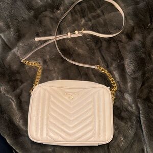 Light pink Michael kors cross body